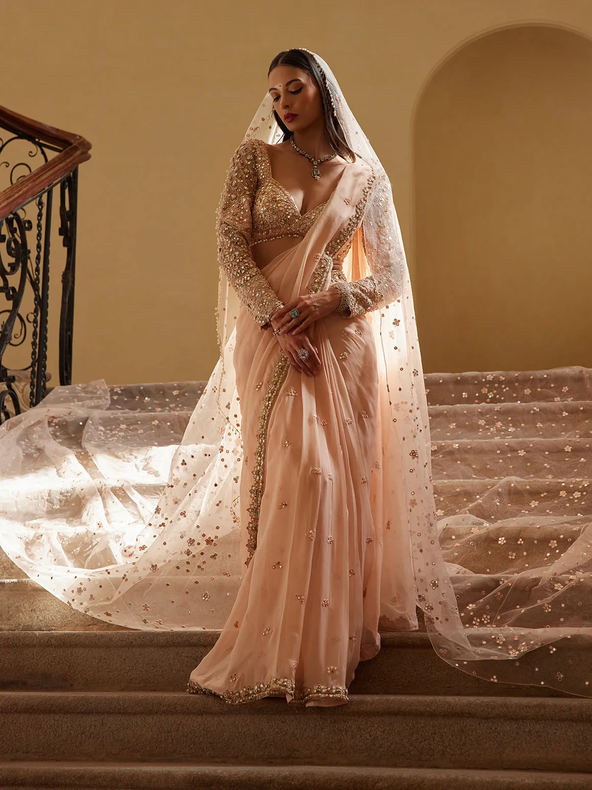 Peach organza draped sari and blouse
