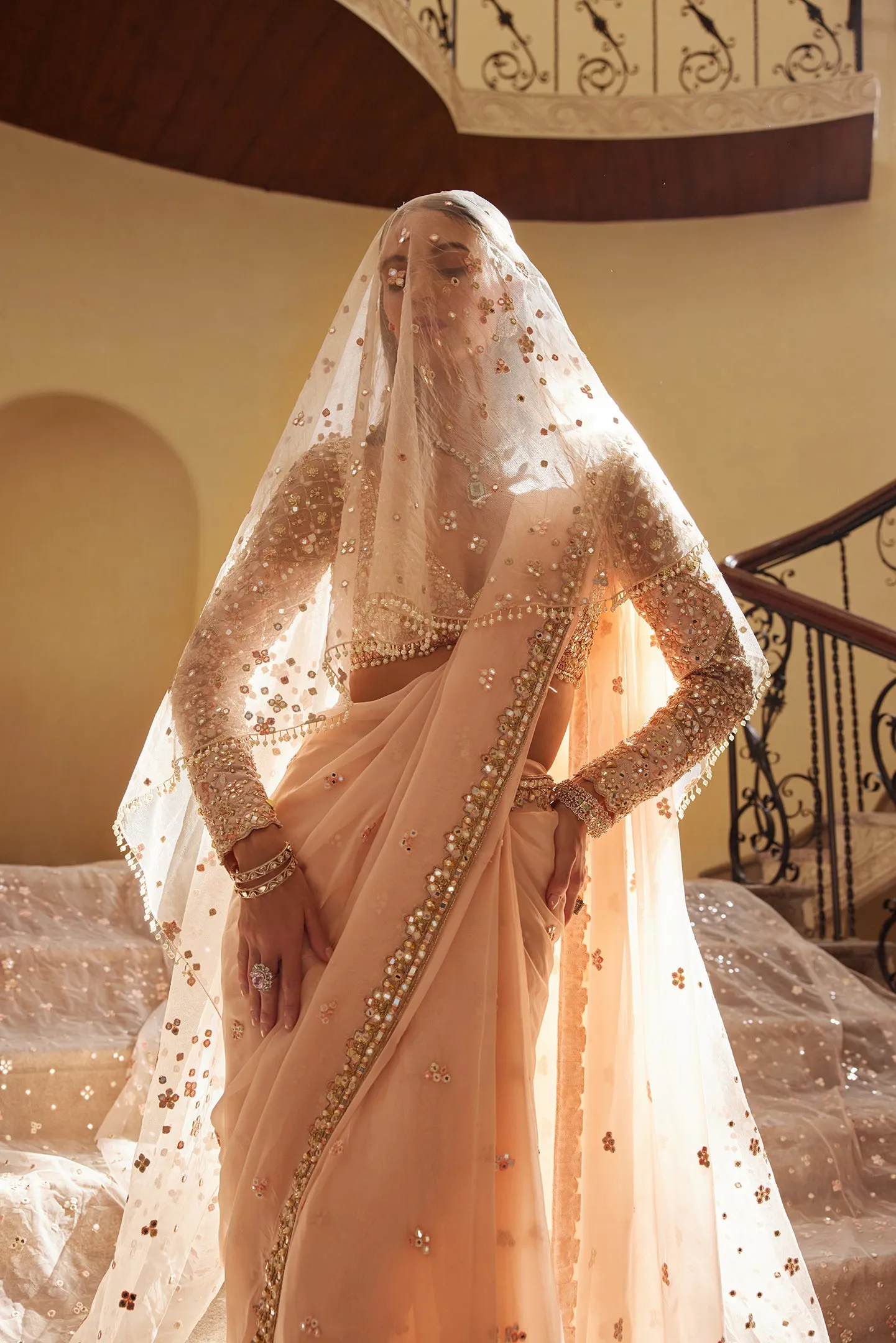 Peach organza draped sari and blouse