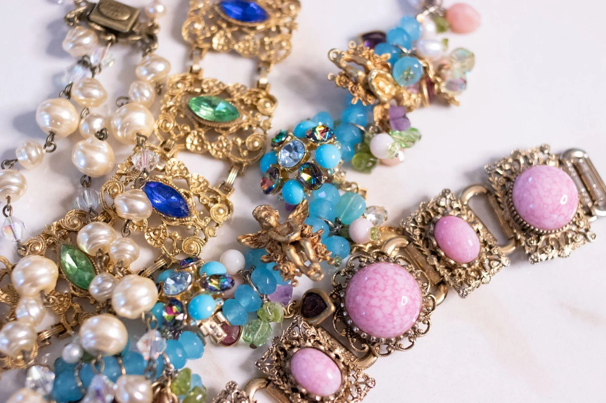 Vintage Kirks Folly Loaded Charm Bracelet with Cherubs, Crystals, Blue Turquoise Beads