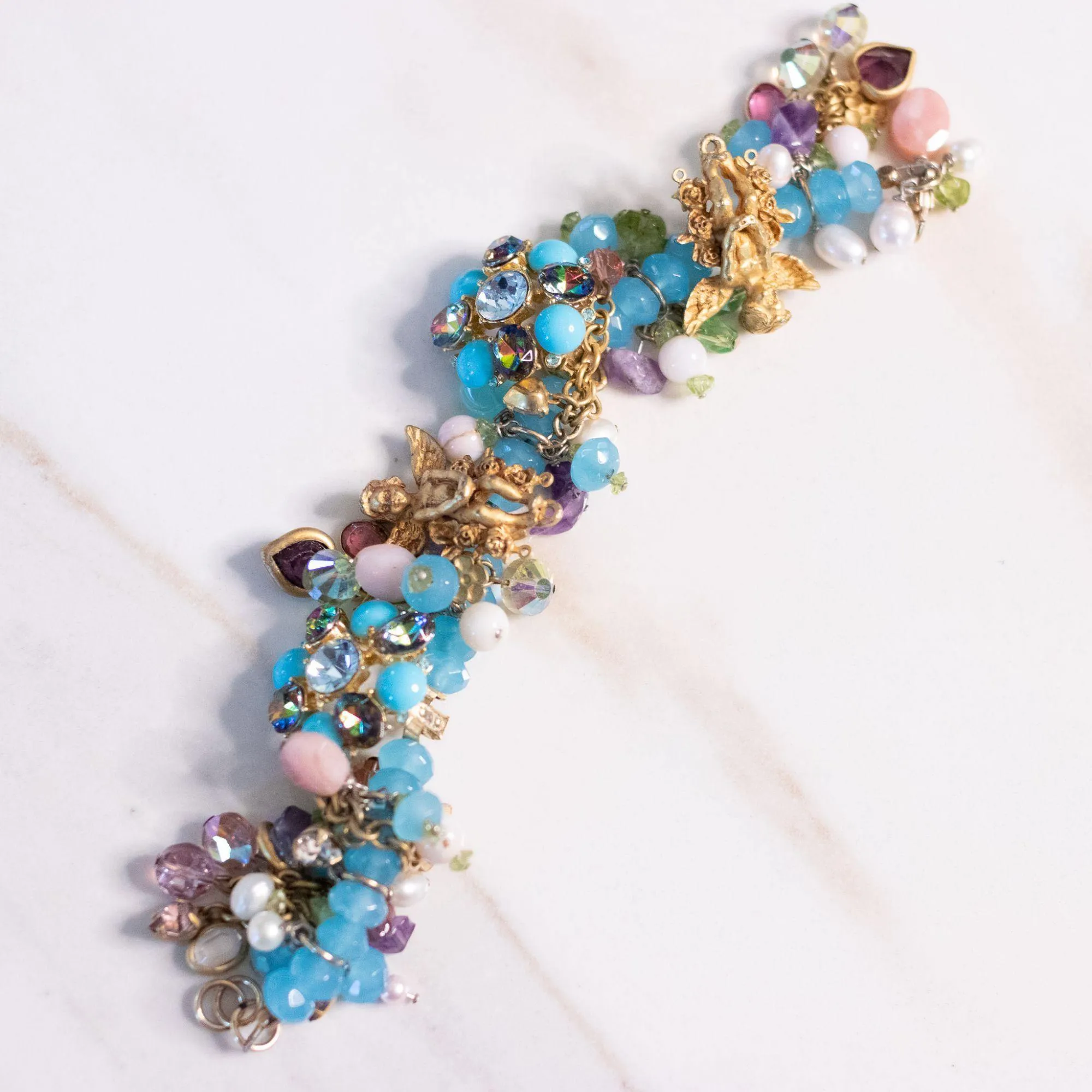 Vintage Kirks Folly Loaded Charm Bracelet with Cherubs, Crystals, Blue Turquoise Beads